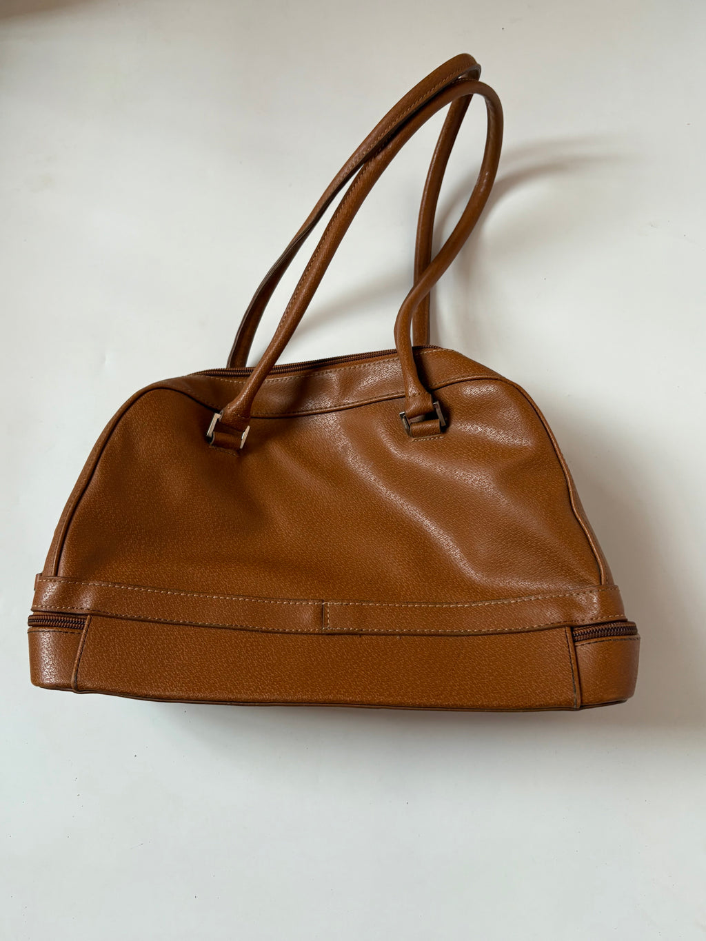 beige hand bag
